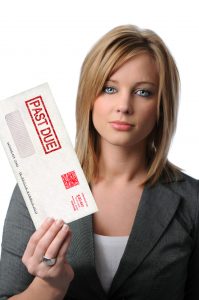 Woman Holding Past Due Envelope
